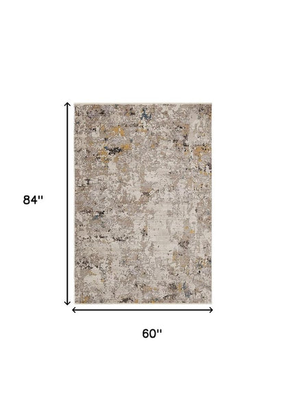 5' X 7' Beige Tan And Gold Abstract Hand Loomed Distressed Area Rug