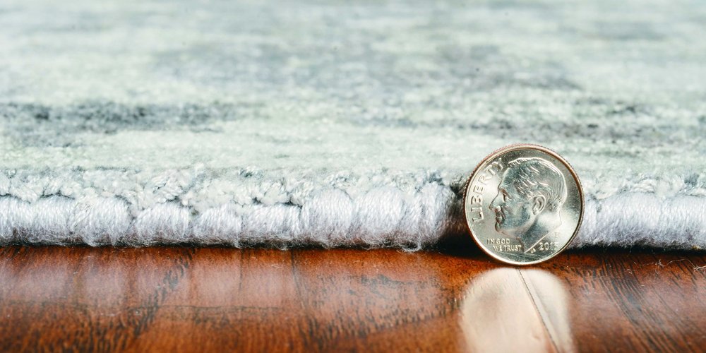 5' X 7' Beige Tan And Gold Abstract Hand Loomed Distressed Area Rug