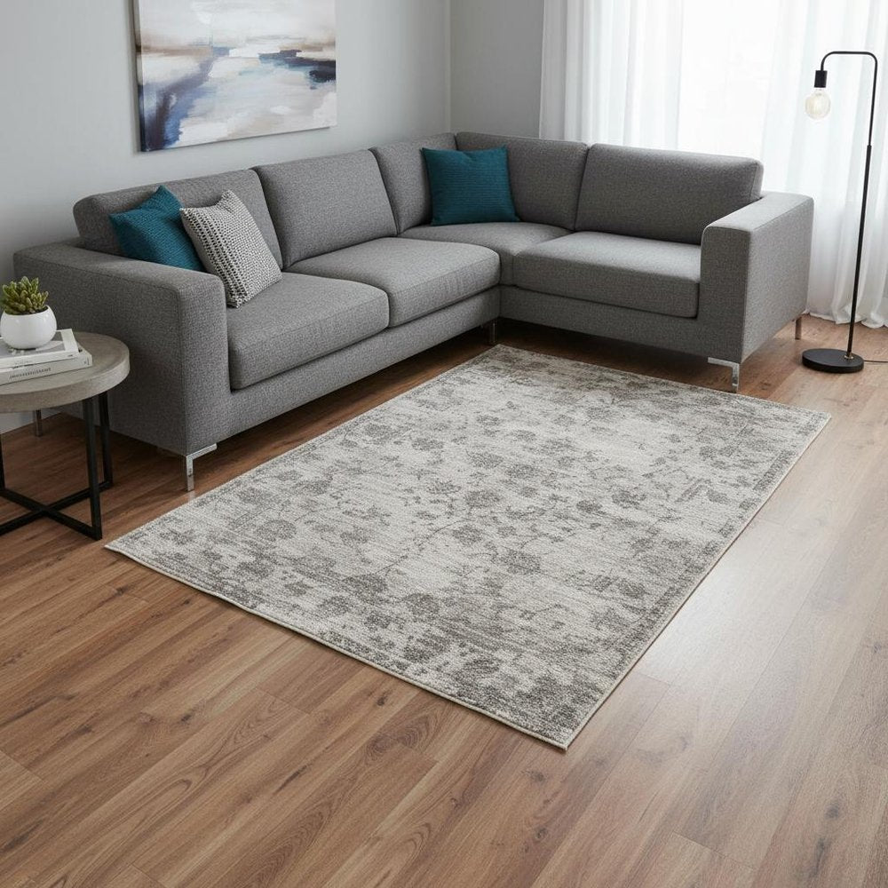 5' X 7' Beige Tan And Gold Abstract Hand Loomed Distressed Area Rug