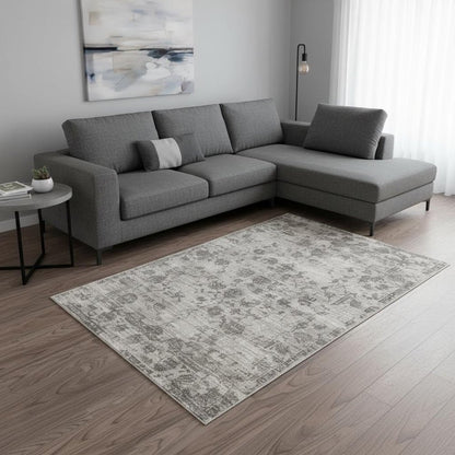 5' X 7' Beige Tan And Gold Abstract Hand Loomed Distressed Area Rug