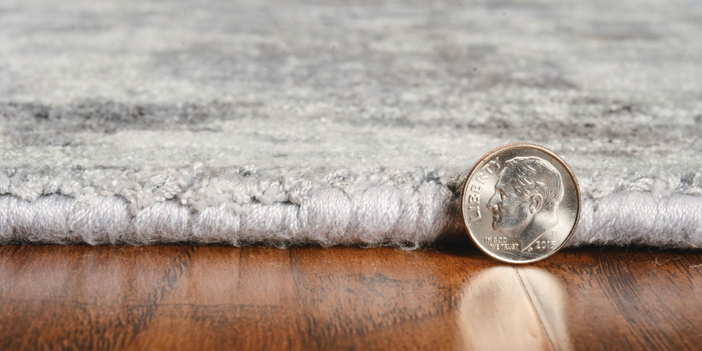 5' X 7' Beige Tan And Gold Abstract Hand Loomed Distressed Area Rug