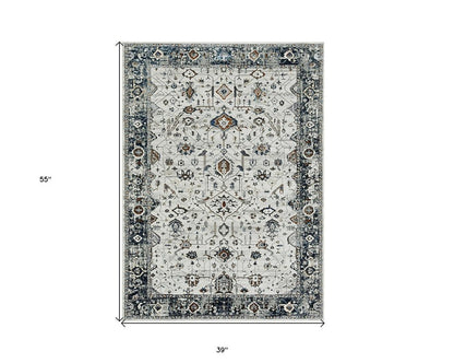 7' Gray And Ivory Floral Medallion Area Rug