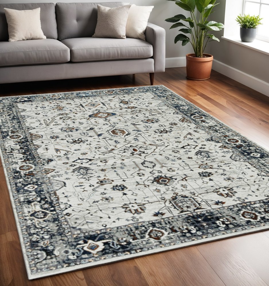 8' X 11' Ivory Gray And Brown Floral Area Rug