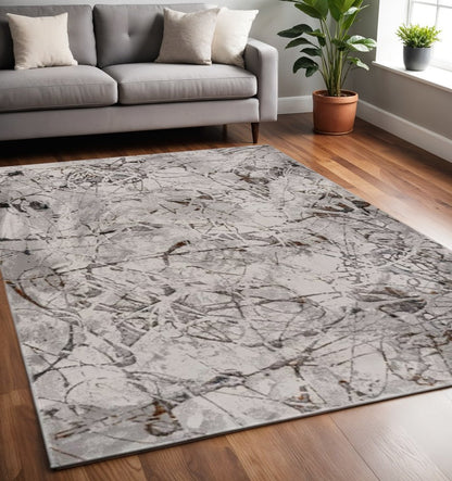 8' X 11' Ivory Gray And Brown Abstract Area Rug