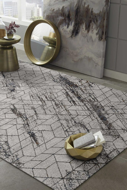 8' X 11' Ivory And Brown Geometric Area Rug