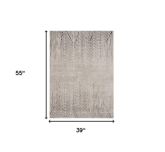 8' X 11' Gray And Ivory Geometric Area Rug