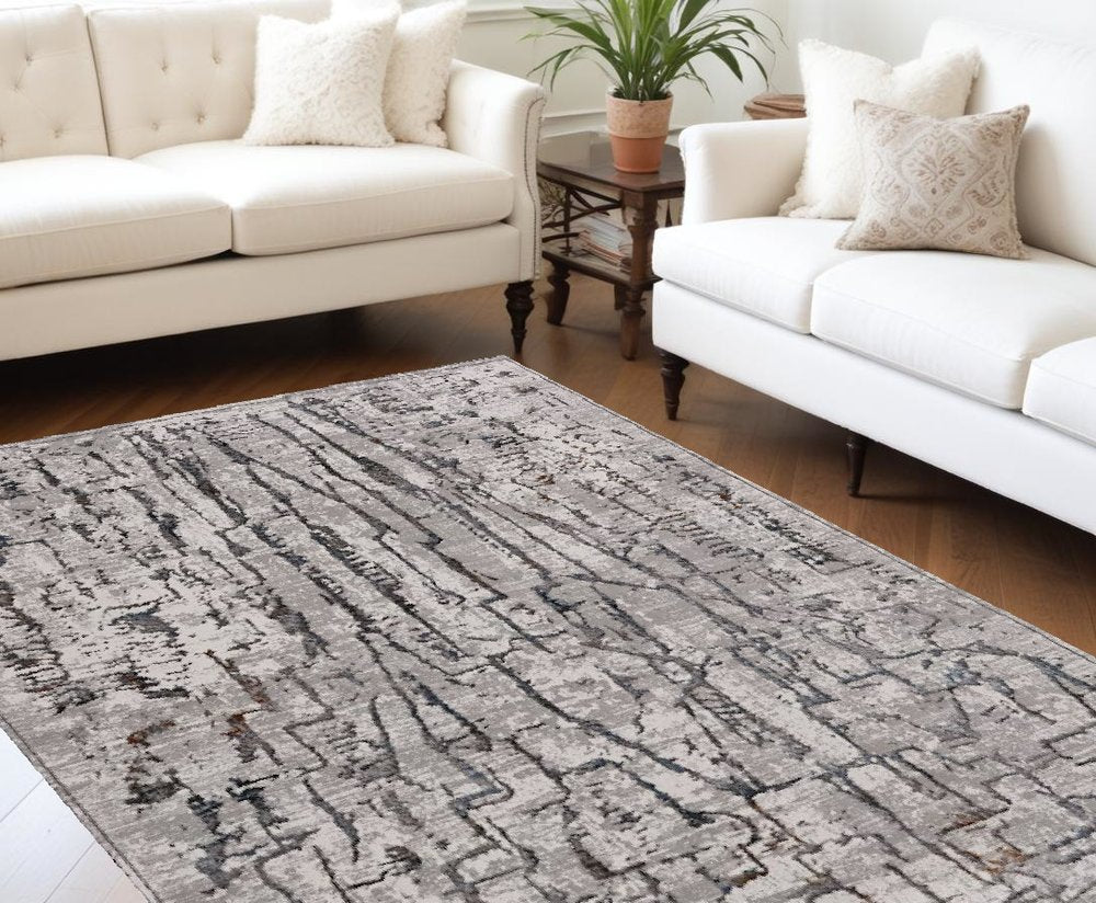6' X 9' Gray And Black Abstract Distressed Area Rug