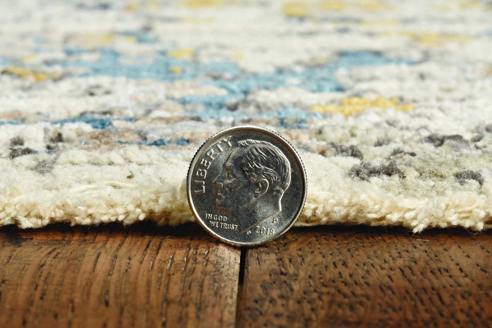 4' x 6' beige, tan and gold abstract distressed area rug