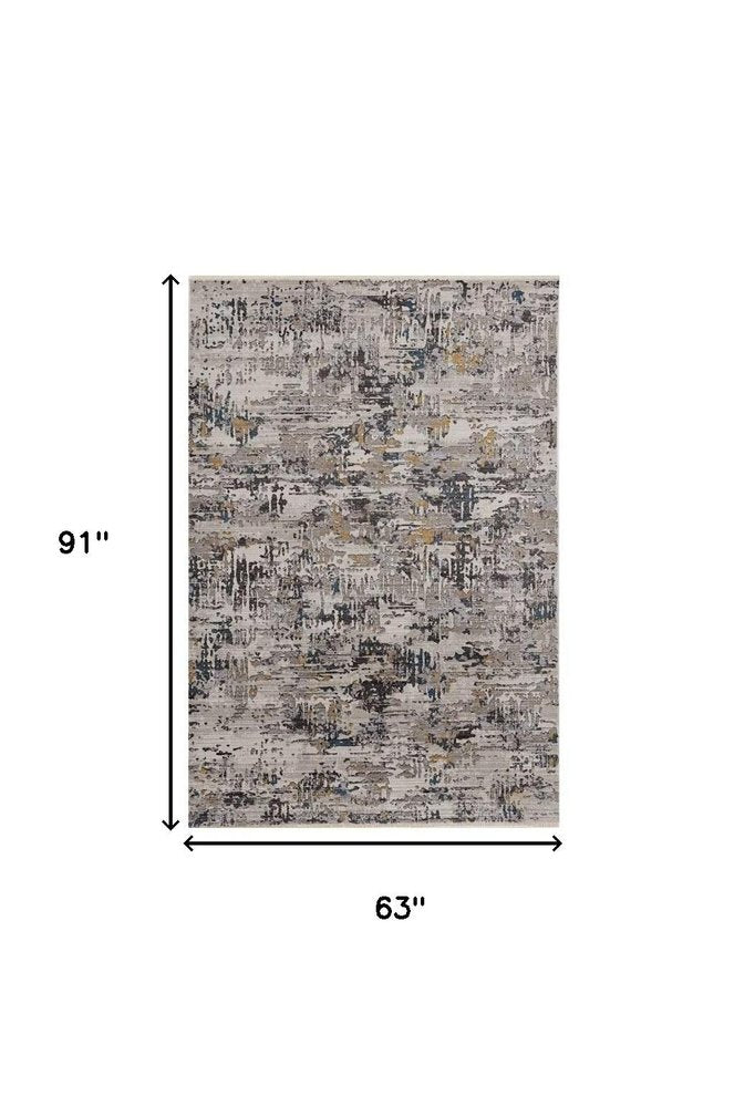 4' X 5' Beige Tan And Gold Abstract Area Rug