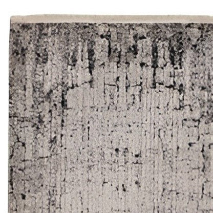 5' X 8' Ivory And Gray Abstract Distressed Area Rug
