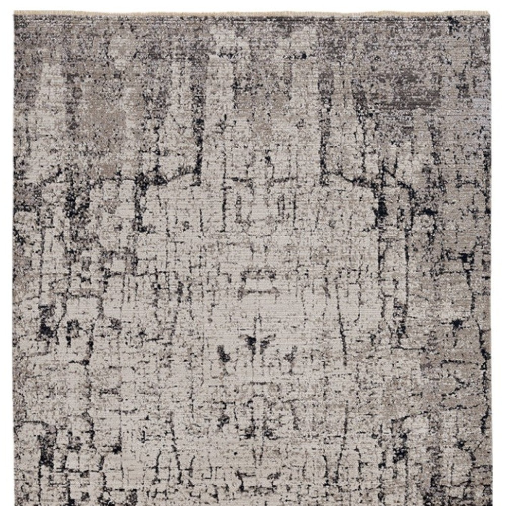 5' X 8' Ivory And Gray Abstract Distressed Area Rug