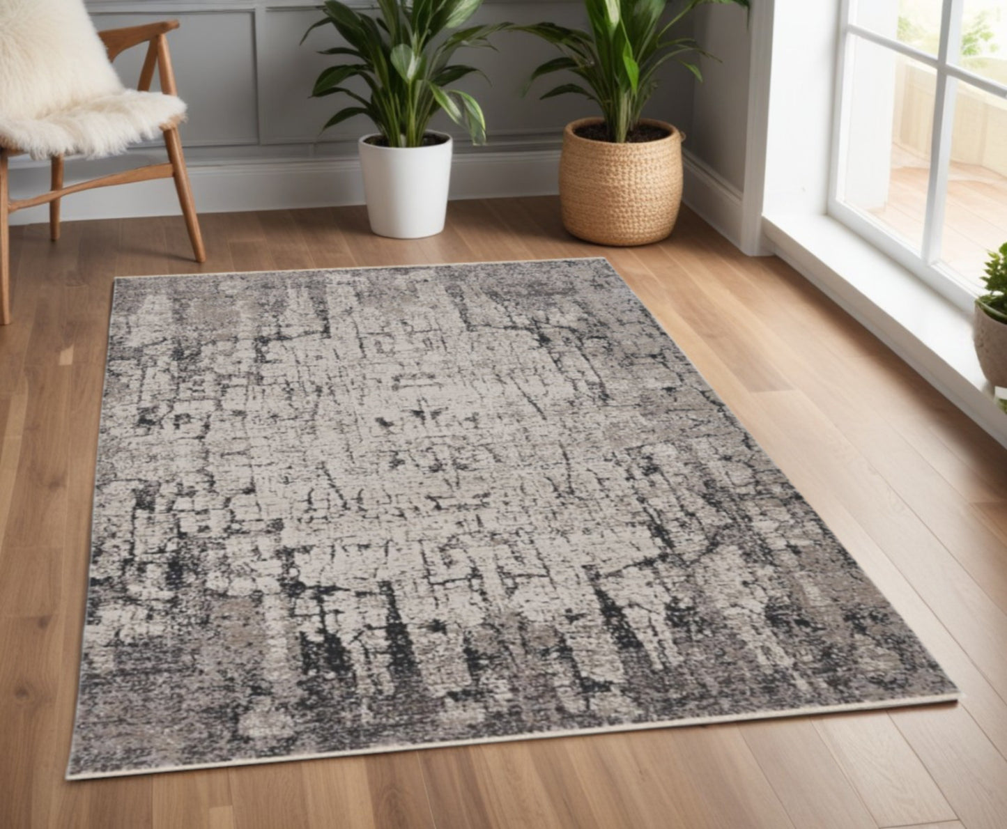 5' X 8' Ivory And Gray Abstract Distressed Area Rug