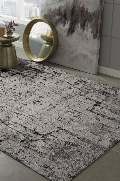 5' X 8' Ivory And Gray Abstract Distressed Area Rug