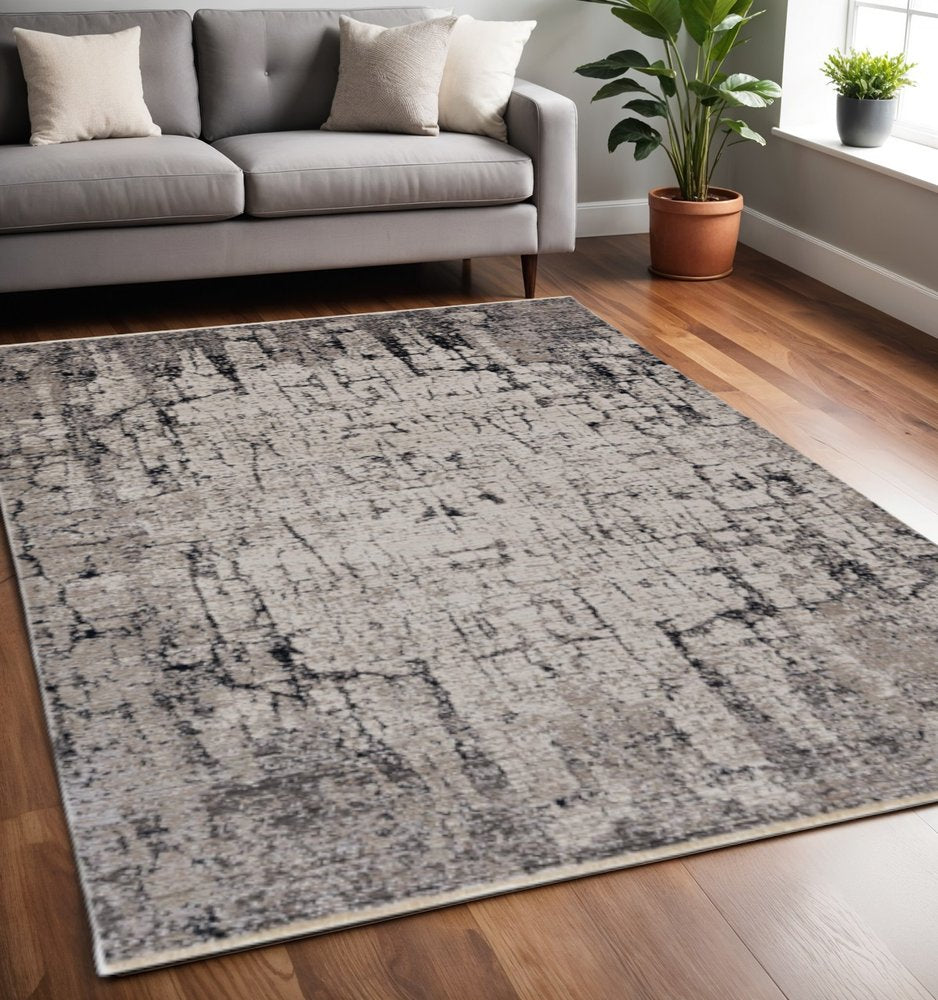 5' X 8' Ivory And Gray Abstract Distressed Area Rug