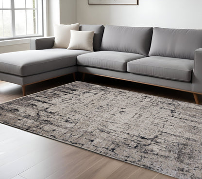 5' X 8' Ivory And Gray Abstract Distressed Area Rug