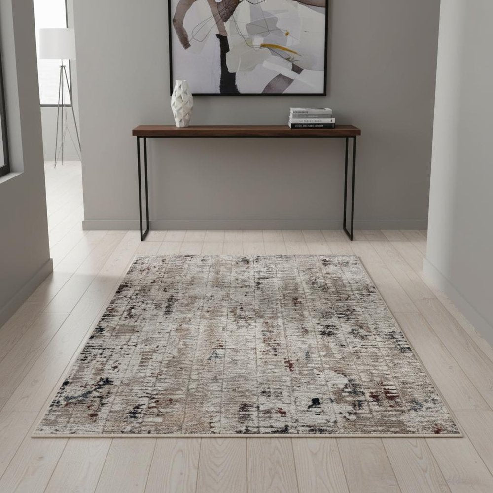 5' X 8' Beige And Gray Abstract Distressed Area Rug