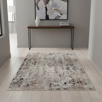 5' X 8' Beige And Gray Abstract Distressed Area Rug