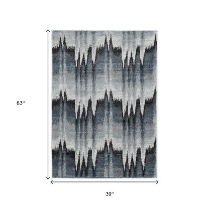 5' X 8' Ivory Blue And Gray Abstract Area Rug