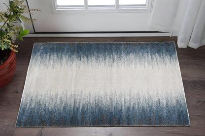 3' X 5' Ivory And Blue Abstract Area Rug