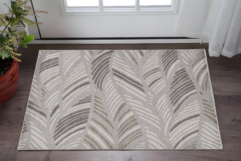 5' X 8' Beige And Brown Tropical Botanical Area Rug