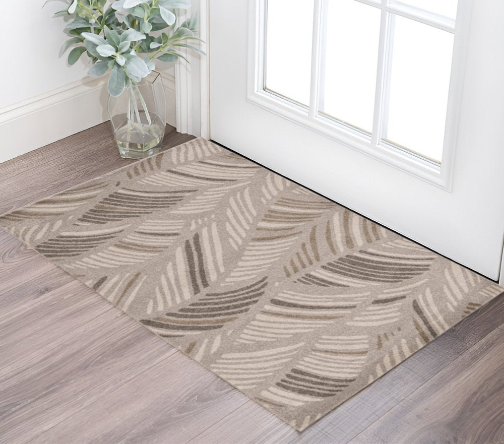 5' X 8' Beige And Brown Tropical Botanical Area Rug