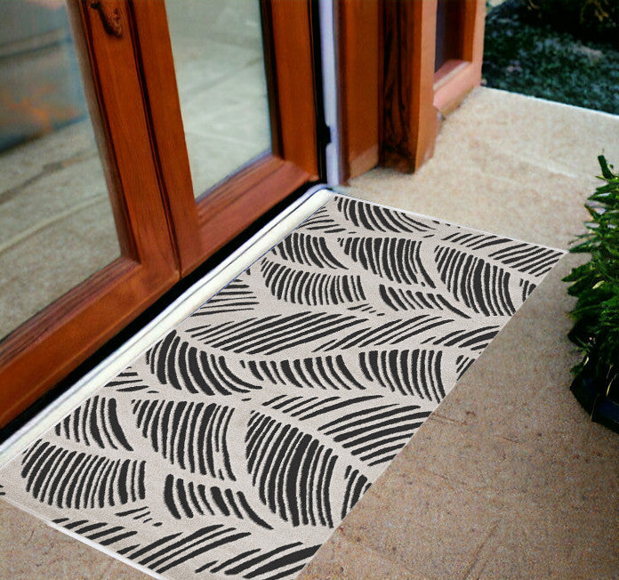 2' X 4' Black and White Abstract Indoor Outdoor Area Rug