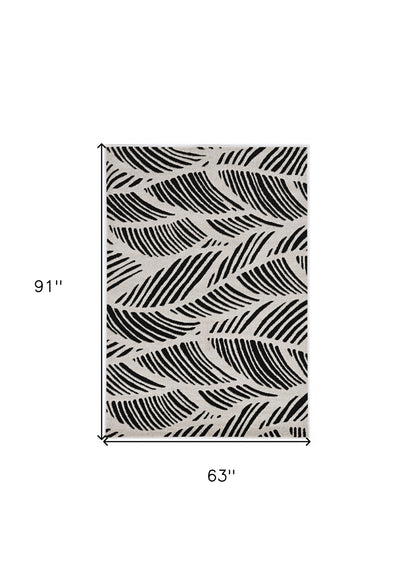 2' X 4' Black And White Abstract Indoor Outdoor Area Rug