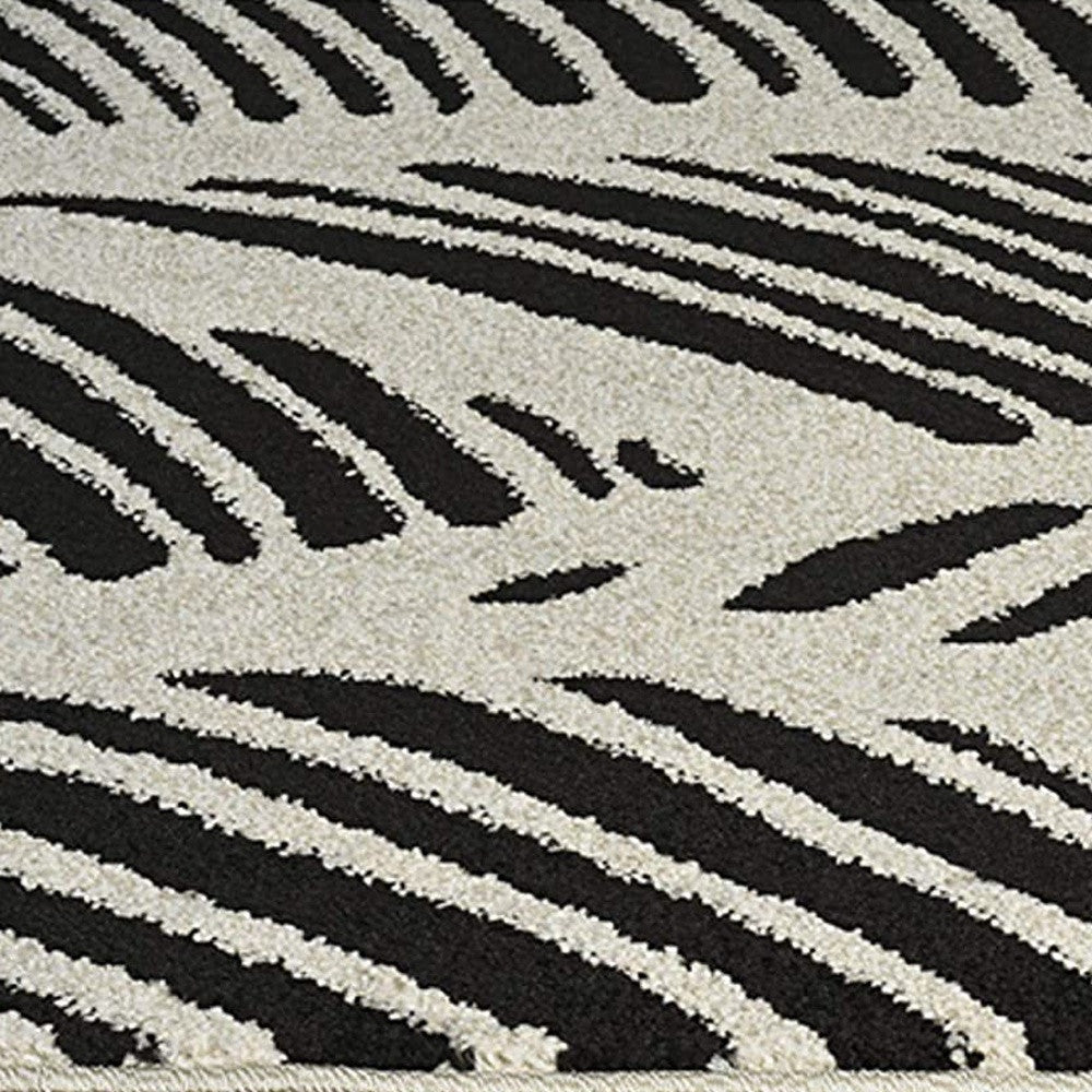 2' X 4' Black and White Abstract Indoor Outdoor Area Rug