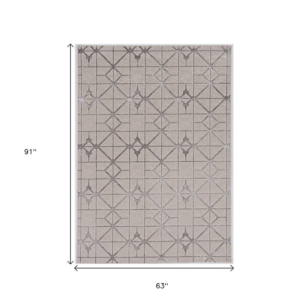 8' X 11' Ivory And Brown Geometric Area Rug