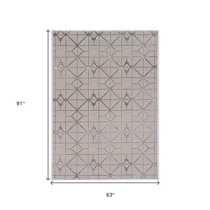 8' X 11' Ivory And Brown Geometric Area Rug