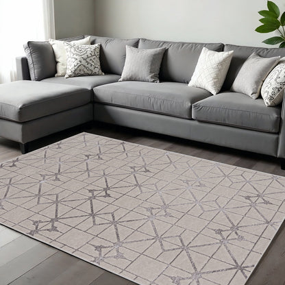 8' X 11' Ivory And Brown Geometric Area Rug
