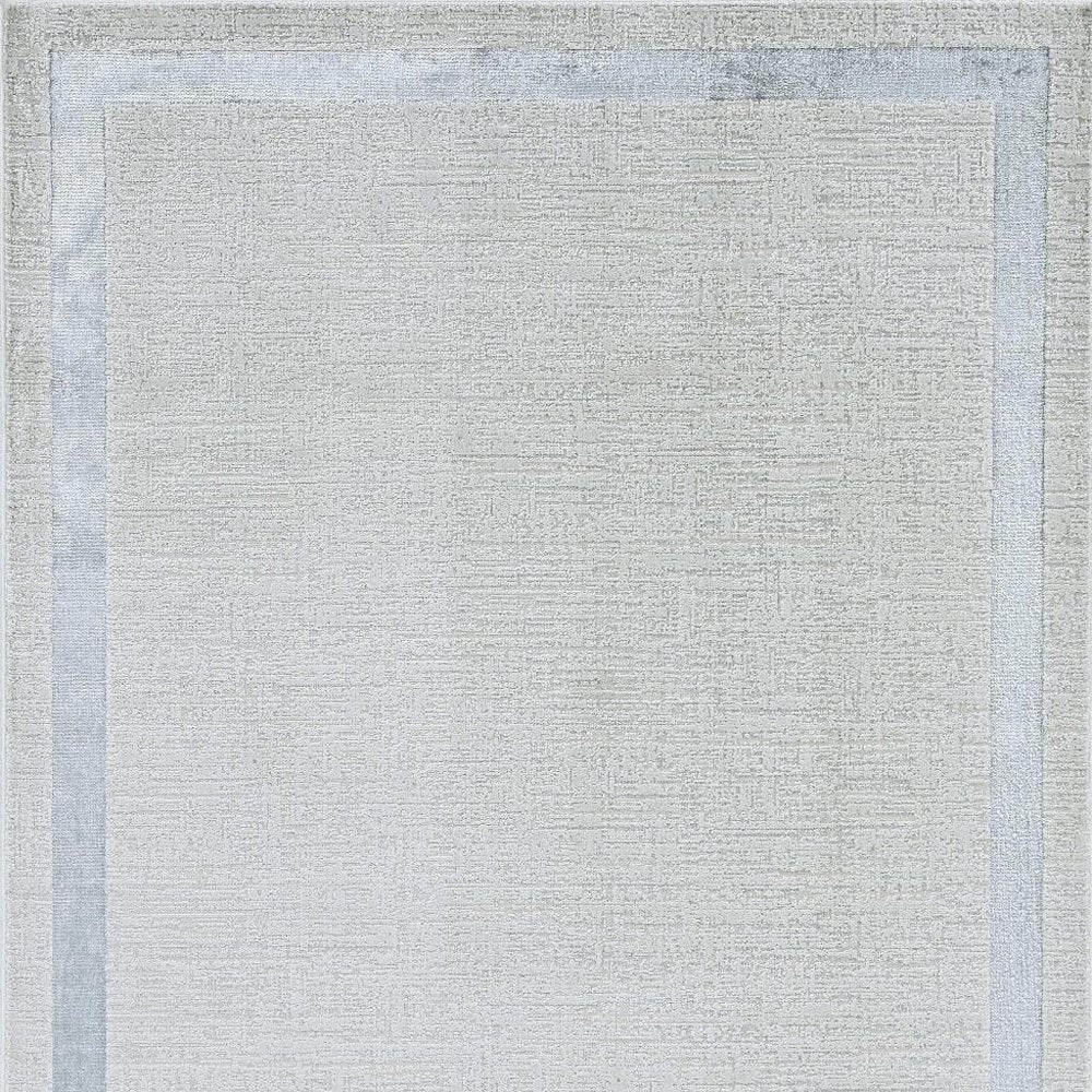 5' X 8' Gray And Ivory Geometric Area Rug