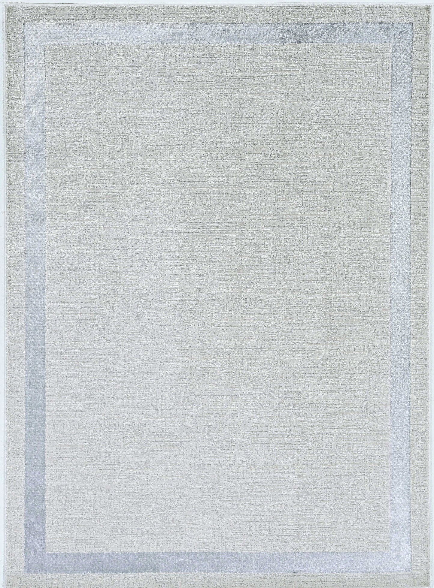 5' X 8' Ivory Silver Machine Woven Bordered Indoor Area Rug