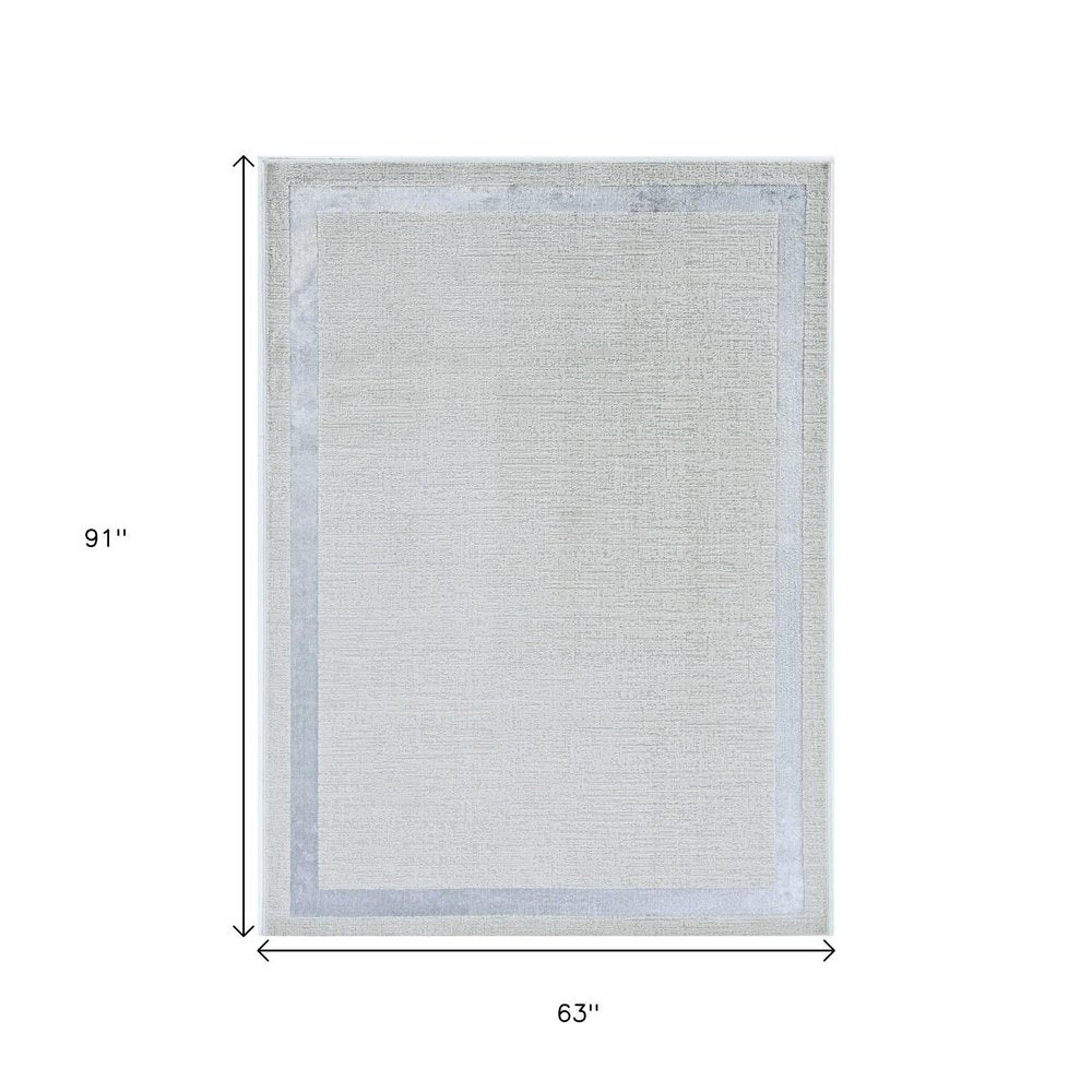 5' X 8' Gray And Ivory Geometric Area Rug