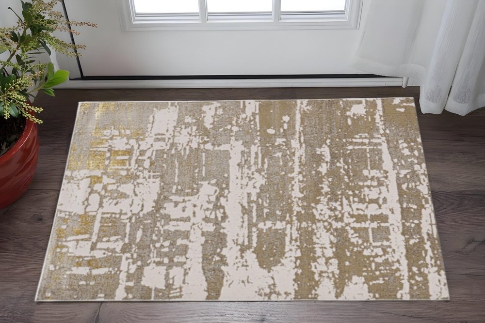 5' X 8' Ivory And Gold Abstract Area Rug