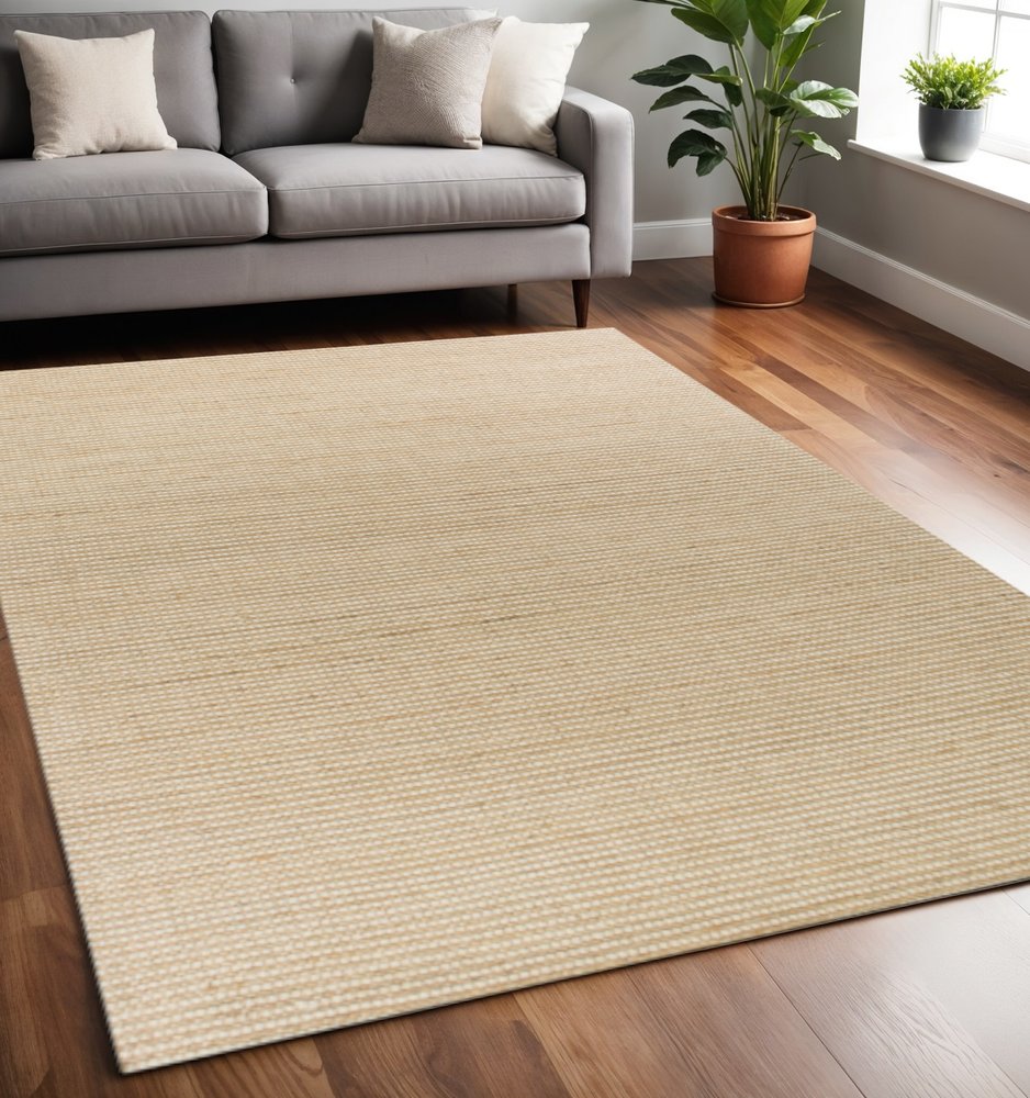 7' X 10' Tan and Ivory Wool Hand Woven Area Rug
