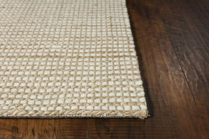 5' X 7' Tan And Ivory Hand Woven Area Rug