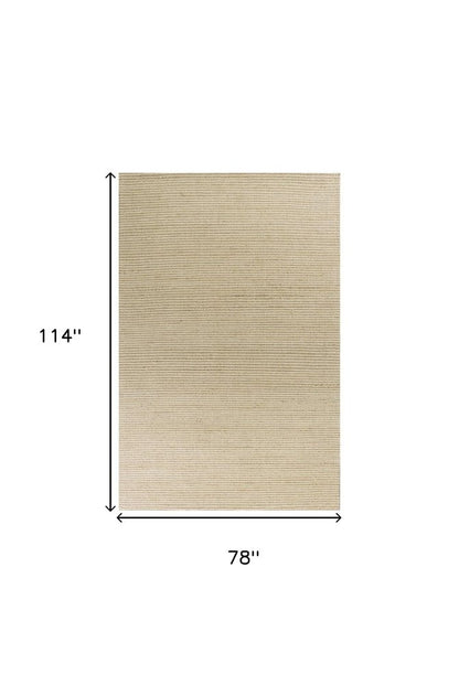5' X 7' Tan And Ivory Hand Woven Area Rug