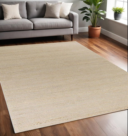 7' X 10' Tan and Ivory Wool Hand Woven Area Rug