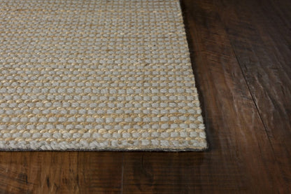5' X 7' Tan And Ivory Hand Woven Area Rug