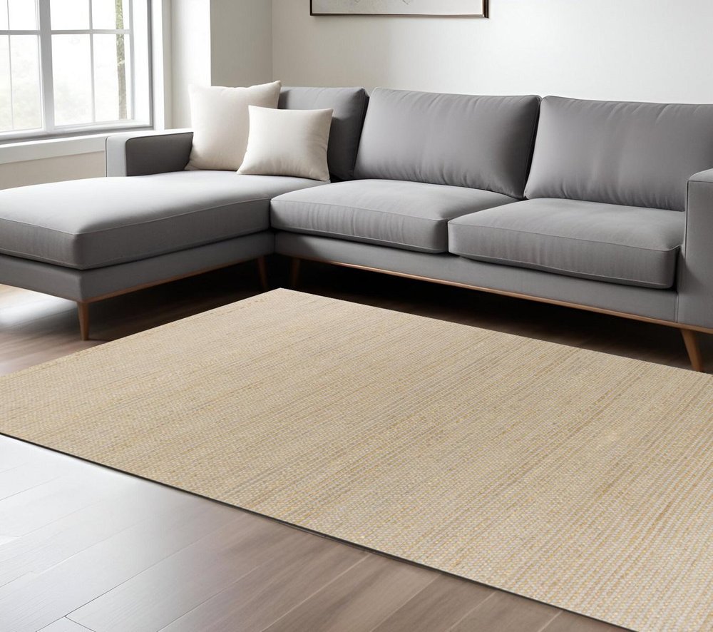 7' X 10' Tan and Ivory Wool Hand Woven Area Rug