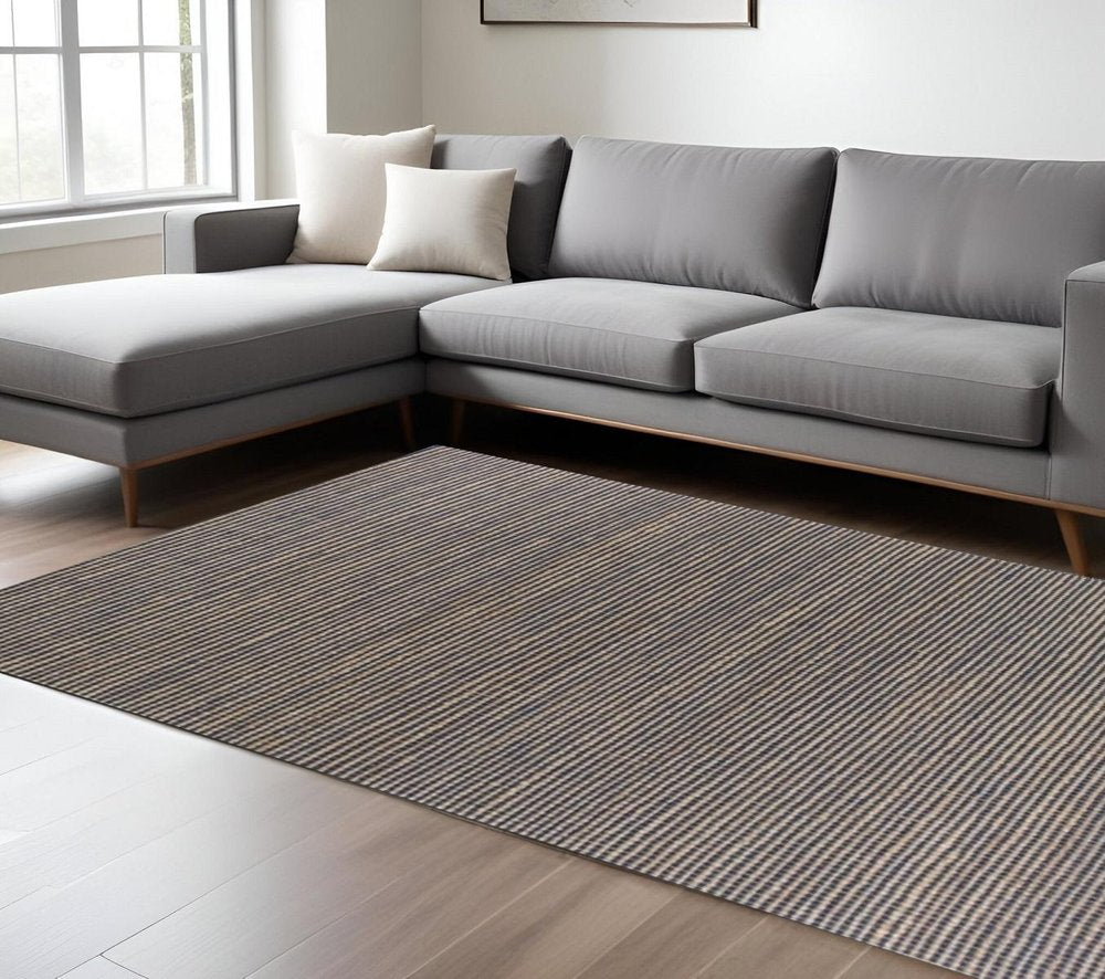 7' X 10' Blue And Beige Abstract Hand Woven Area Rug