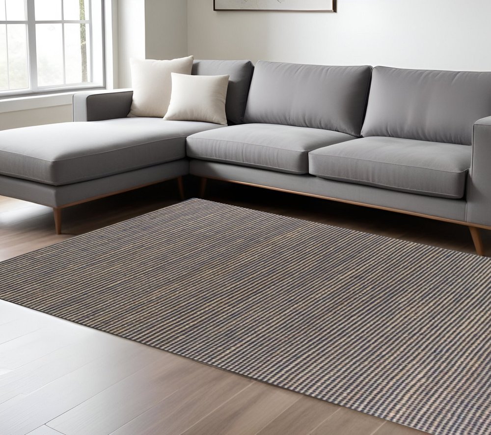 7' X 10' Blue And Beige Abstract Hand Woven Area Rug