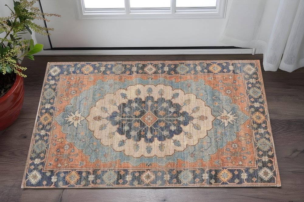 8' X 10' Blue Orange And Black Medallion Hand Woven Distressed Area Rug