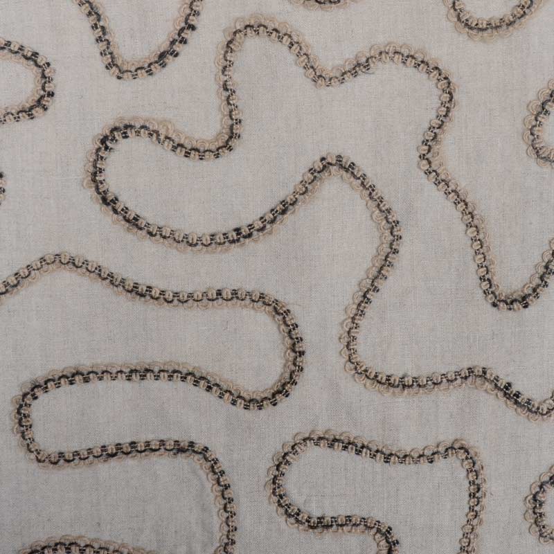 Beige fabric with dark-beige beaded trim forming curvy, serpentine lines across the surface.