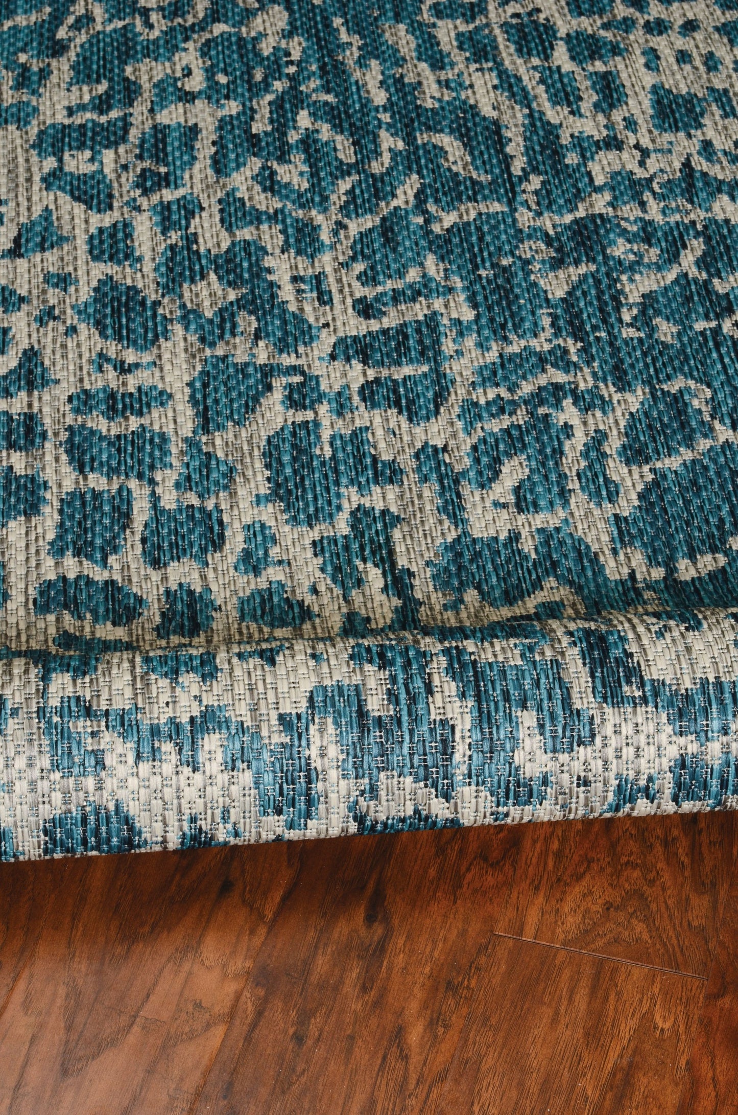 5' X 8'  Teal Animal Print Outdoor Area Rug