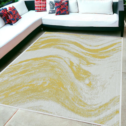 8' Gold And Ivory Abstract Indoor Outdoor Area Rug