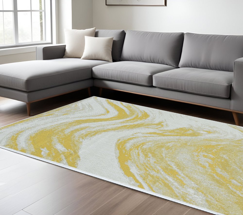 8' X 11' Ivory And Gold Abstract Area Rug
