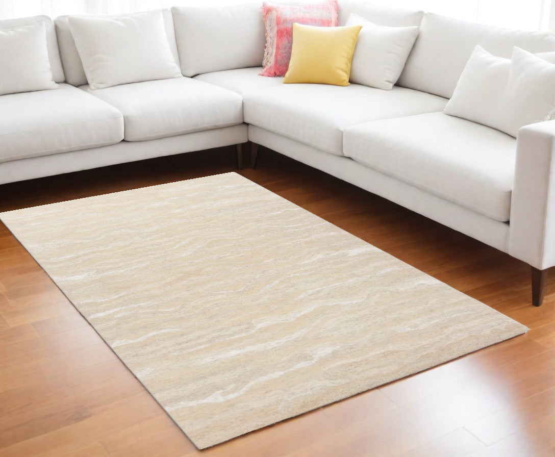 5' X 7' Ivory Hand Tufted Abstract Indoor Area Rug