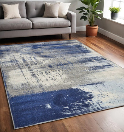 3' X 5' Blue Ivory And Gray Abstract Area Rug